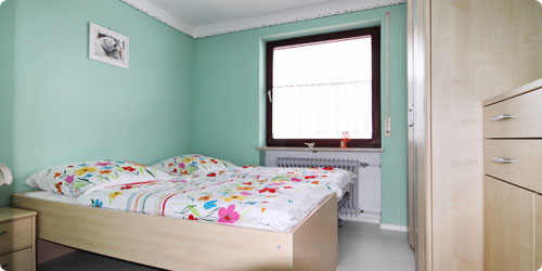 Schlafzimmer Ferienhaus SIggi - familie Stapf Stoffenried